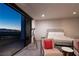 Bedroom with elegant decor, city views, and access to a private balcony at 438 Serenity Point Dr, Henderson, NV 89012