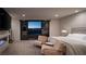 Bedroom featuring a fireplace and doors to a balcony with city views at 438 Serenity Point Dr, Henderson, NV 89012