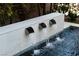 Beautiful pool feature with tiled wall and three water cascade features at 438 Serenity Point Dr, Henderson, NV 89012