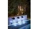 Modern pool with custom waterfall feature creating a soothing ambiance at 438 Serenity Point Dr, Henderson, NV 89012