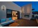Relax on the rooftop patio, featuring an outdoor fireplace and access to the home gym at 438 Serenity Point Dr, Henderson, NV 89012