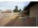 Spacious backyard with a classic birdbath and a block wall fence at 4536 E Baltimore Ave, Las Vegas, NV 89104