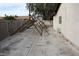 Concrete backyard featuring a metal structure and a block wall at 4536 E Baltimore Ave, Las Vegas, NV 89104
