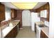 Classic kitchen with laminate countertops and neutral appliances at 4536 E Baltimore Ave, Las Vegas, NV 89104