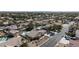 Expansive aerial view of a suburban neighborhood featuring a home with a private pool and RV parking at 4690 Designer Way, Las Vegas, NV 89129