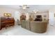 Bright living room features vaulted ceiling, fireplace, piano, and neutral colors at 4690 Designer Way, Las Vegas, NV 89129