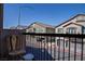 Relaxing balcony view overlooking neighborhood homes with well-maintained exteriors at 4705 Blaise Ave # 101, North Las Vegas, NV 89084