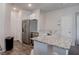 The kitchen features stainless steel appliances, granite countertops, and ample counter space at 4705 Blaise Ave # 101, North Las Vegas, NV 89084