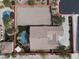 Aerial view of property with a large backyard area and a pool, highlighting the home's layout and outdoor space at 6392 Ebony Legends Ave, Las Vegas, NV 89131