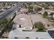 Expansive aerial view of single Gathering home featuring desert landscaping and a long, paved driveway at 6392 Ebony Legends Ave, Las Vegas, NV 89131