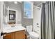 Bathroom featuring a single sink vanity with a tub and shower combination at 6392 Ebony Legends Ave, Las Vegas, NV 89131