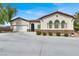Attractive home featuring a large driveway and tile roof at 6392 Ebony Legends Ave, Las Vegas, NV 89131