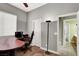 Home office with wood floors, a ceiling fan, and natural light from a window at 6392 Ebony Legends Ave, Las Vegas, NV 89131