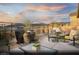 Tranquil backyard retreat featuring an outdoor seating area with mountain views at 6826 Sweet Bay St # Lot 10, Las Vegas, NV 89166