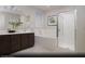 Bright primary bathroom with dual sinks, a soaking tub, and a glass-enclosed shower at 6826 Sweet Bay St # Lot 10, Las Vegas, NV 89166
