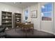 Functional home office space featuring built-in shelving, a desk and picturesque mountain views at 6826 Sweet Bay St # Lot 10, Las Vegas, NV 89166