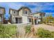 Charming home with a two car garage, landscaped front yard, and neutral color palette at 683 Quasi St, Henderson, NV 89011