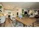 Bright, open-concept kitchen with modern appliances, a kitchen island, and adjacent dining area at 683 Quasi St, Henderson, NV 89011