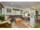 Bright living room with lots of natural light, modern furnishings, and stylish decor at 683 Quasi St, Henderson, NV 89011
