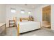 Bright bedroom with a walk-in and large windows at 683 Quasi St, Henderson, NV 89011