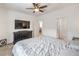 Well-lit bedroom featuring a television, and an ensuite bathroom at 7232 N Decatur Blvd # 4, Las Vegas, NV 89131