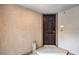 Exterior entry featuring a dark wood door with a 'Welcome' sign at 7232 N Decatur Blvd # 4, Las Vegas, NV 89131