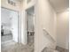 Upstairs hallway showcasing neutral carpeting and contemporary doors leading to bedrooms at 7232 N Decatur Blvd # 4, Las Vegas, NV 89131