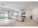 Living room featuring a slider to the back patio with artificial grass at 7232 N Decatur Blvd # 4, Las Vegas, NV 89131
