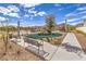 Community playground with benches, mature landscaping, and easy sidewalk access at 7232 N Decatur Blvd # 4, Las Vegas, NV 89131