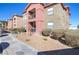 Exterior view of a two-story condo unit with balcony at 8000 W Badura Ave # 1130, Las Vegas, NV 89113