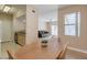 Open floor plan showcasing the dining area, kitchen, and living room at 8000 W Badura Ave # 1130, Las Vegas, NV 89113