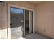 Enclosed patio with concrete flooring and sliding glass doors for indoor/outdoor living at 8000 W Badura Ave # 1130, Las Vegas, NV 89113