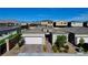 Attractive home featuring a well-maintained front yard, covered entry, and attached two-car garage at 8525 Stokestone St, Las Vegas, NV 89166