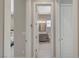 Hallway view leading to a bathroom and bedroom; shows the interior layout of the home at 8525 Stokestone St, Las Vegas, NV 89166