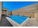 Stunning backyard pool with ample patio space, ideal for outdoor relaxation and entertainment at 8525 Stokestone St, Las Vegas, NV 89166