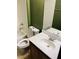 Cozy bathroom with a modern vanity, mirror, toilet, and shower/tub combination at 8777 W Maule Ave # 2167, Las Vegas, NV 89148