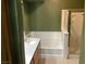 Bathroom with double sink vanity and tiled shower-tub combination at 8777 W Maule Ave # 2167, Las Vegas, NV 89148