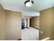 Neutral toned bedroom featuring recessed lights, wall texture, and black closet door at 8777 W Maule Ave # 2167, Las Vegas, NV 89148