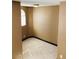 Comfortable bedroom featuring neutral carpeting and a large window for natural light at 8777 W Maule Ave # 2167, Las Vegas, NV 89148