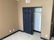 Bedroom with closet featuring dark sliding doors and an organized interior at 8777 W Maule Ave # 2167, Las Vegas, NV 89148