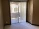 Bedroom featuring sliding glass door with patio access at 8777 W Maule Ave # 2167, Las Vegas, NV 89148
