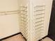 Walk-in closet with installed shoe racks and ample shelving space at 8777 W Maule Ave # 2167, Las Vegas, NV 89148
