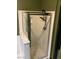 Corner shower with glass door, shower head, and shelves at 8777 W Maule Ave # 2167, Las Vegas, NV 89148