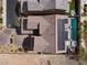 An aerial view of home showcasing the pool, solar panels, tile roof, and landscaping at 8895 Dartmouth Grove Ave, Las Vegas, NV 89148