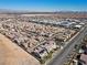 Stunning aerial view of a residential neighborhood, showcasing the meticulously designed homes and well-maintained streets at 8895 Dartmouth Grove Ave, Las Vegas, NV 89148