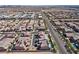 Detailed aerial perspective of a residential area highlighting rooftops, streets, and organized layout of homes at 8895 Dartmouth Grove Ave, Las Vegas, NV 89148