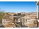 Inviting balcony with comfortable chairs and a cozy fire pit, perfect for enjoying the scenic mountain views at 8895 Dartmouth Grove Ave, Las Vegas, NV 89148