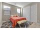Bedroom features a comfortable rug, natural light, and closet space at 8895 Dartmouth Grove Ave, Las Vegas, NV 89148