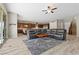 Spacious living room featuring an open floor plan and tile floors at 8895 Dartmouth Grove Ave, Las Vegas, NV 89148