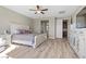 The main bedroom offers tile floors, a ceiling fan and ample storage space at 8895 Dartmouth Grove Ave, Las Vegas, NV 89148
